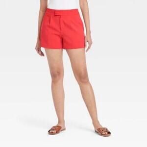 Red shorts with zipper closure